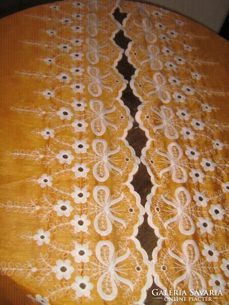 A pair of beautiful madeira embroidered special curtains with orange and white flowers