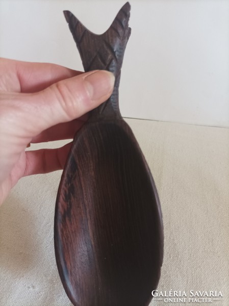 Carved wooden spoon in the shape of a pineapple, dark brown