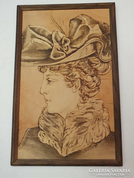Pyrograph female portrait. With Bodony sign