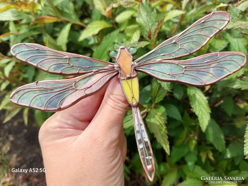A unique glass dragonfly made using the Tiffany technique