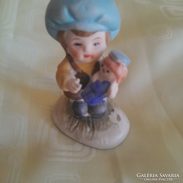 Charming child with doll 8 cm