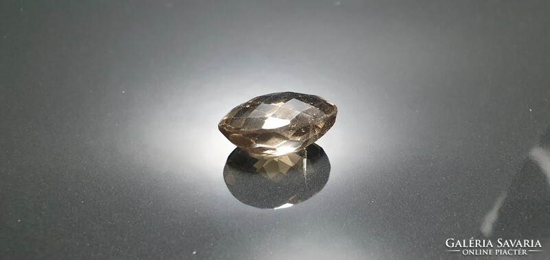 Smoky quartz 23.46 carats. Special chessboard sanding. With certification.