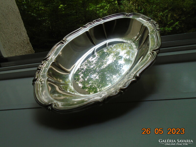 Baroque silver-plated marked oval bowl with embossed rim