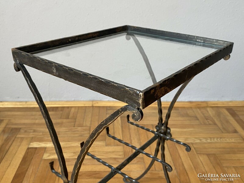 Nicely shaped, practical wrought iron side table with glass top