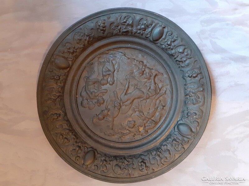 Cast iron bowl marked, mythological scene stove snow colored black iron decorative wall bowl