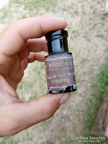 Old bottle with ink label, Müller brothers