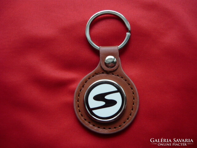 Trabant (sign) metal key ring on a leather base