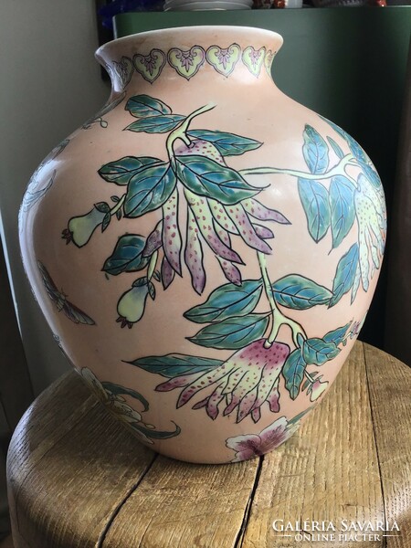 Old oriental hand-painted porcelain vase