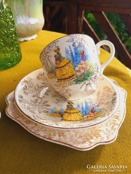 A wonderful gilded English porcelain trio