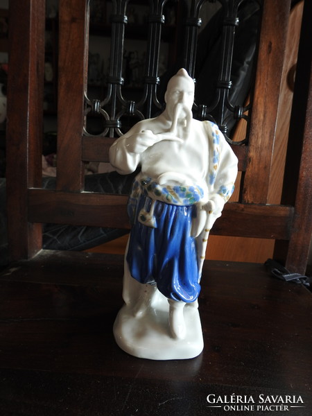Oriental figure - porcelain sculpture