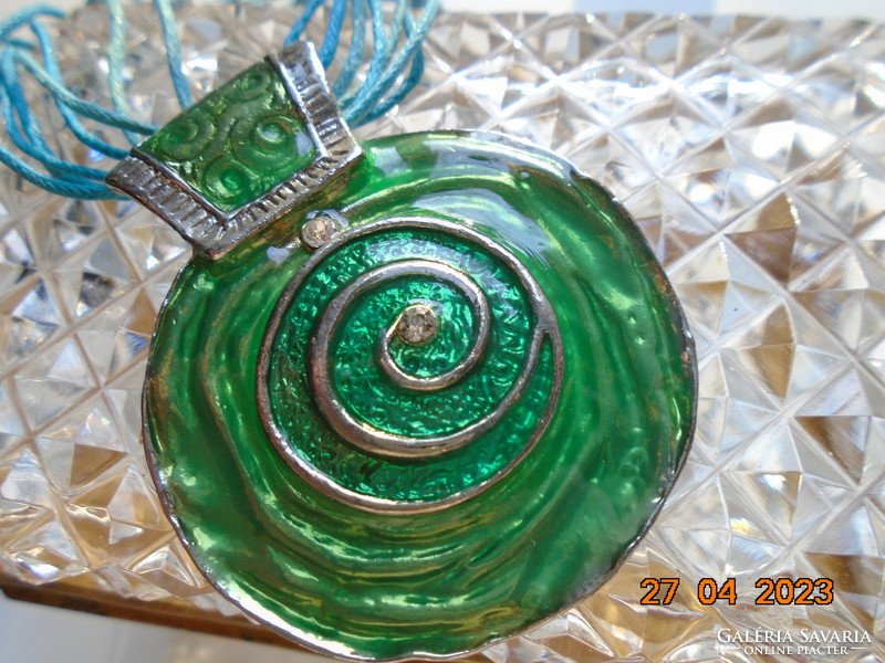 Iridescent green enamel silver-plated pendant with convex spiral, blue multi-line cord