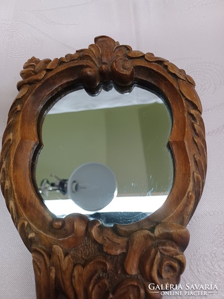 Wood carved hand mirror
