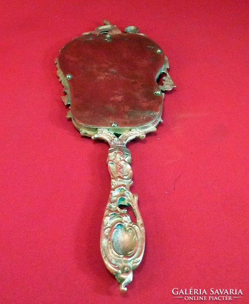 Antique copper hand mirror. In a nice decorative frame.