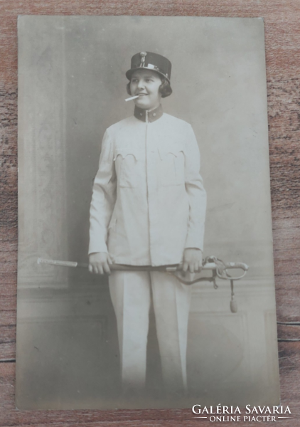 Old vintage young girl in white military uniform, sword, cigarette approx. 1920-30 - Postcard photo