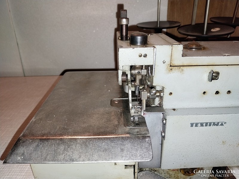 Three-thread textima industrial interlock sewing machine, riveter 220v, good condition