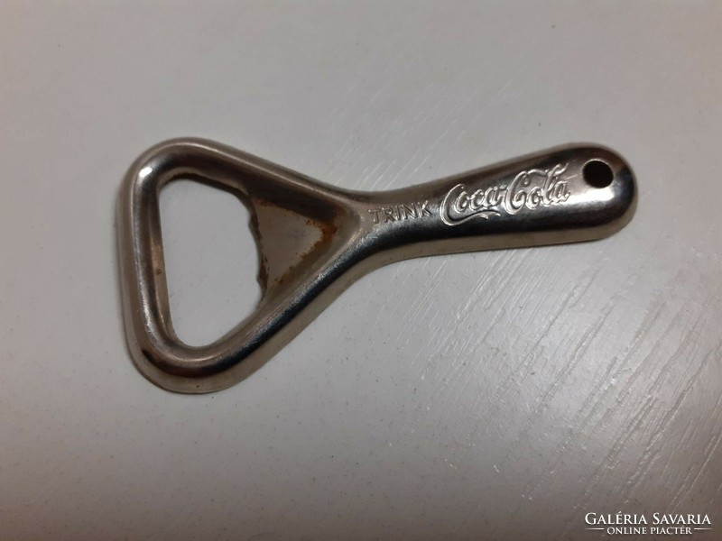 Inscription on the handle of an old Trink coca cola beer opener