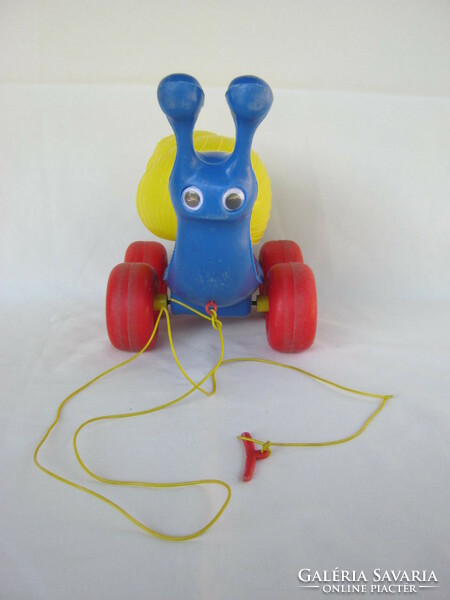 Is it rare? Retro tobacconist plastic pull toy snail