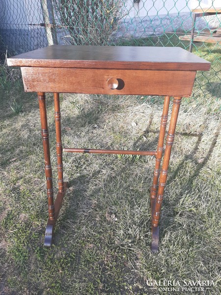 Stylish antique small table with drawers