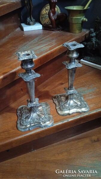 A pair of Art Nouveau heavily silver-plated candle holders, 24 cm