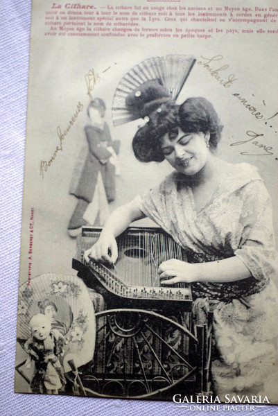 Antique photo postcard lady dressed as a geisha with a zither toy Asian doll