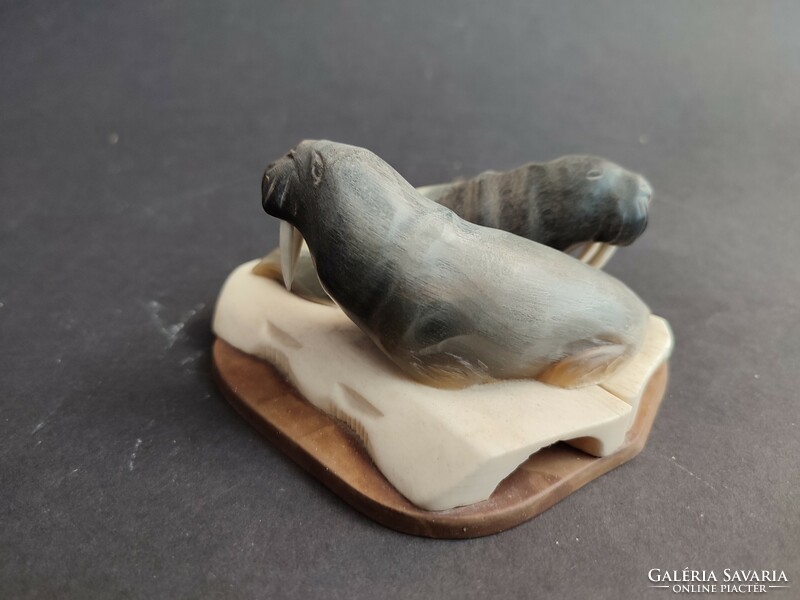 Seals on the broken ice, bone horn carving - ep