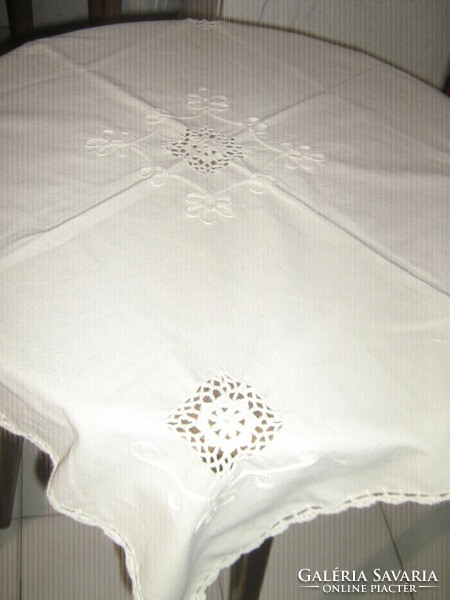 Beautiful hand-crocheted raw white tablecloth with inset and edge sewn on