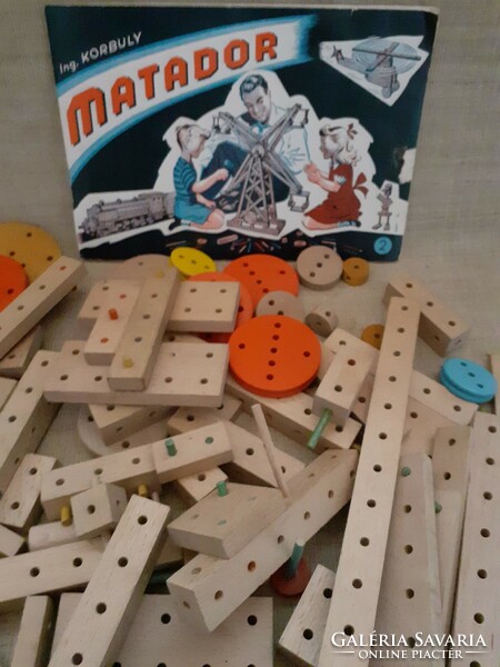 Old retro wooden matador building toy with ingredients booklet