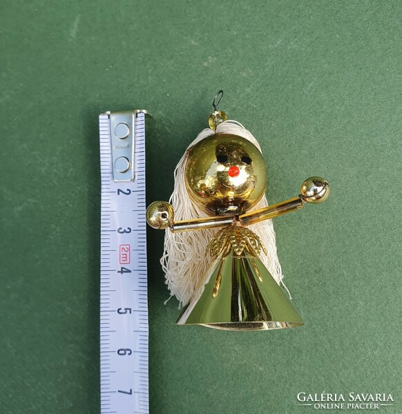 Figurative Christmas tree decoration in the shape of an old retro tapestry glass girl