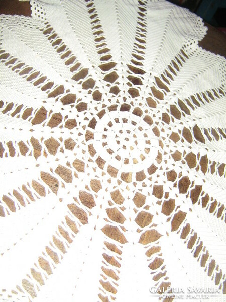 Beautiful antique hand-crocheted boat-shaped cream tablecloth