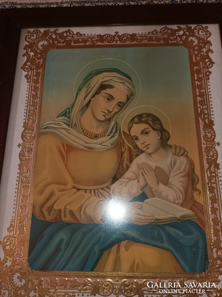 Laced holy image in a framed pair