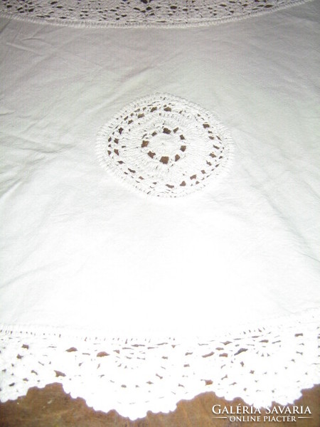Beautiful special white hand-crocheted antique round linen tablecloth