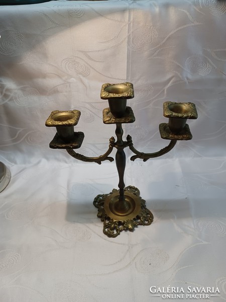 Three-pronged copper candlestick