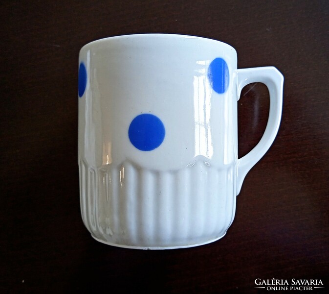 Blue polka dot mug with a wavy skirt