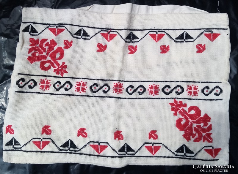 Ethnographic embroidered cushion cover retro.