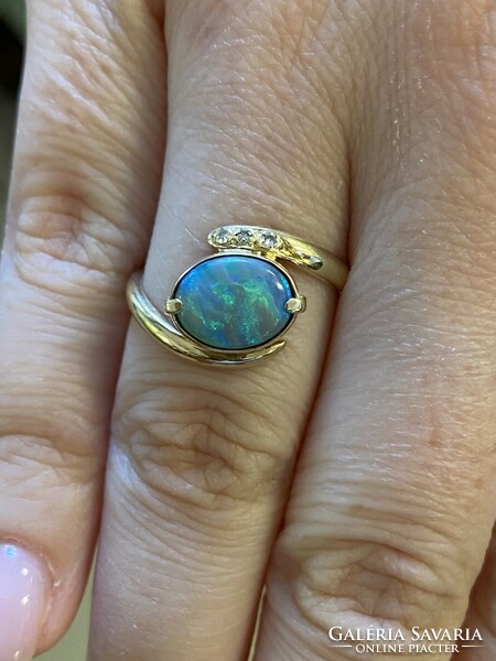 14 carat gold ring with opal and diamond!