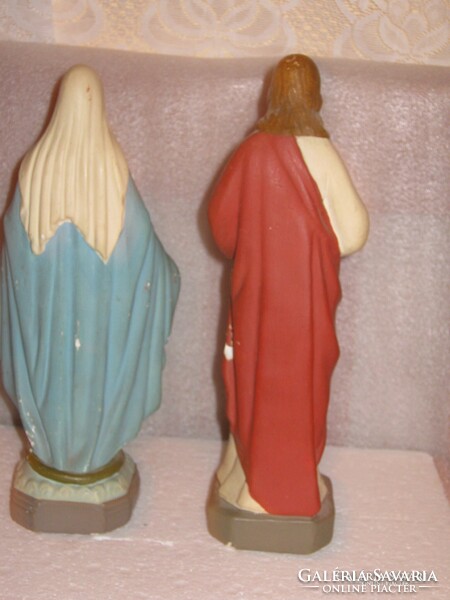Old holy statues of Jesus and Virgin Mary.