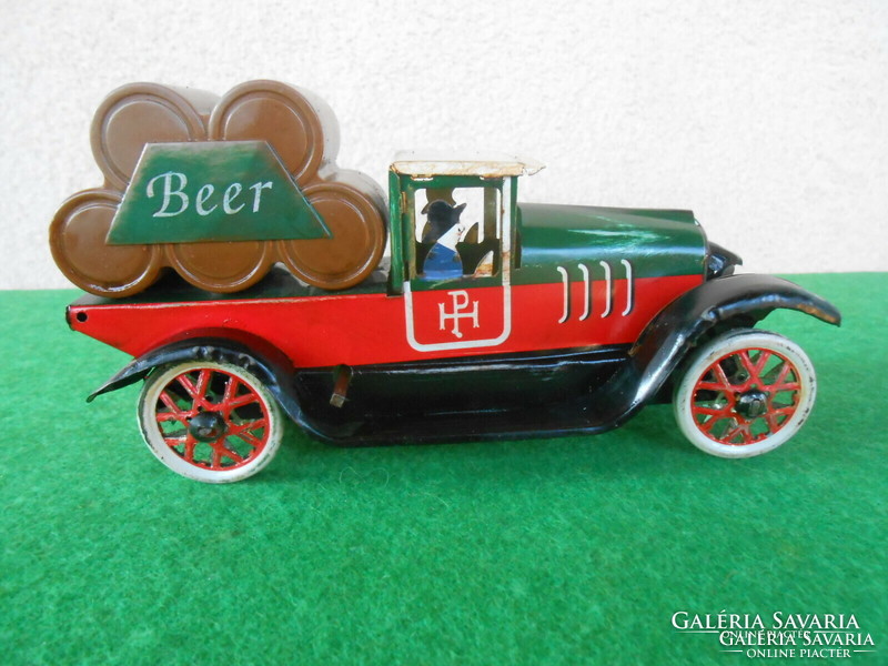 Old clockwork toy car with original box