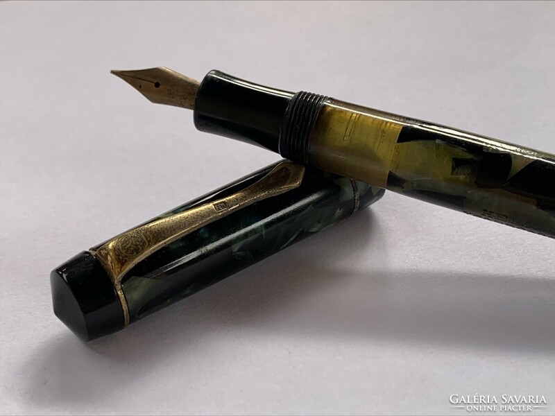 Helios transparent retro fountain pen 14 k. With a golden tip