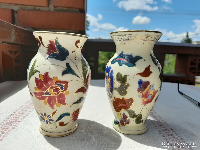 A pair of antique Zsolnay-style decorative vases