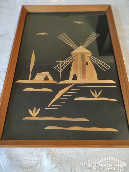 Straw image with a windmill