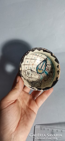 Antique bird in Middle Eastern bowl