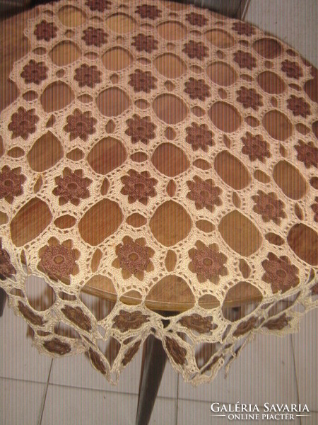 Beautiful antique hand-crocheted brown-beige tablecloth runner with a special flower pattern