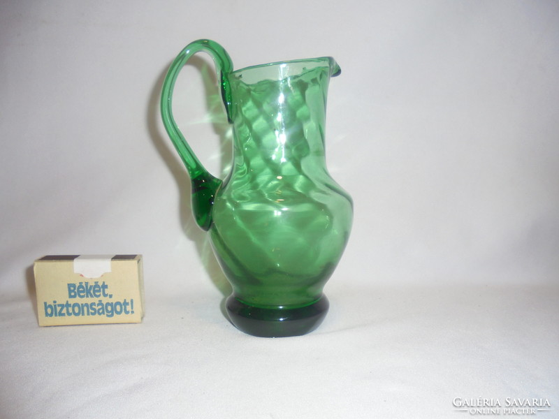 Old, smaller green glass jug