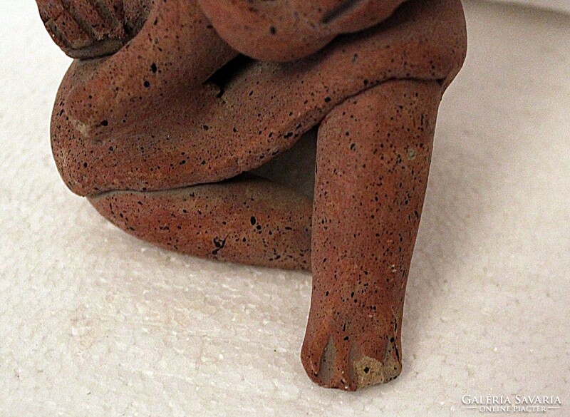 Maya clay sculpture