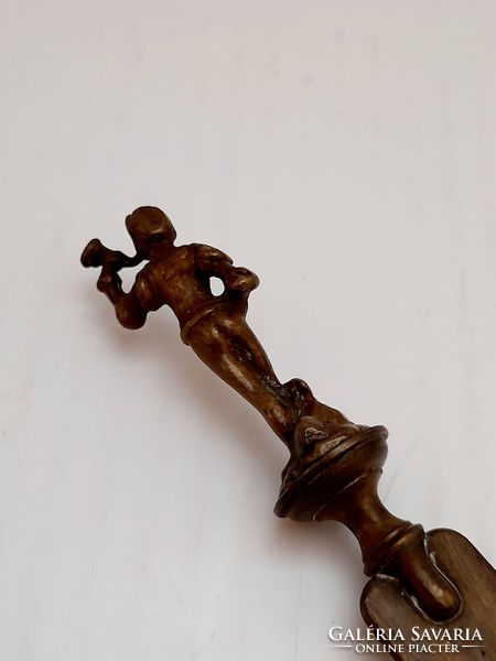 Antique copper with leaf-opening figure