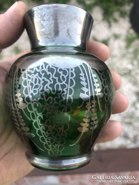 Old silver-plated green glass vase with the inscription Venice