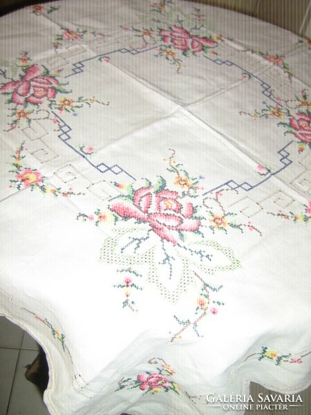 Beautiful tablecloth embroidered with azure cross stitch