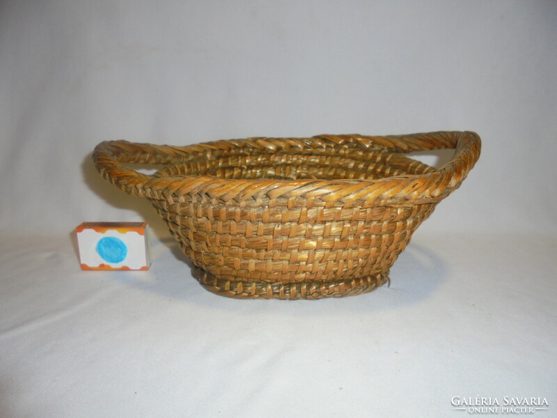 Old cane wicker basket, table offering, fruit basket