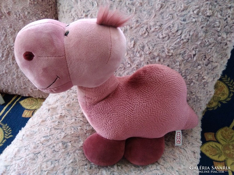 Baby pink dino Nici is looking for a new owner!