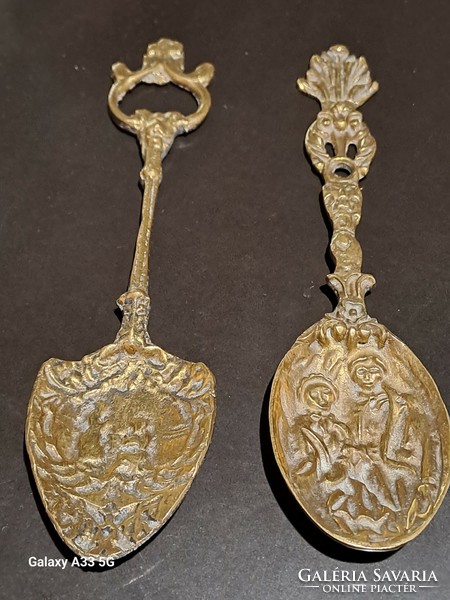 Antique English brass decorative spoon duo